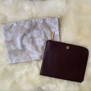 Dagne Dover burgundy leather travel clutch